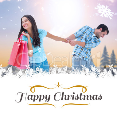 Composite image of happy couple with shopping bag