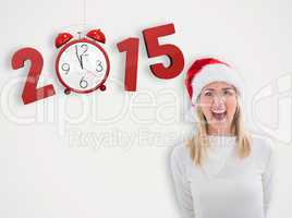 Composite image of stressed blonde in santa hat