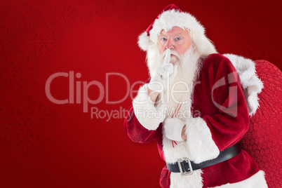 Composite image of santa asking for quiet with bag