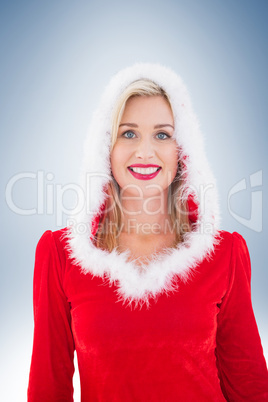 Festive blonde smiling at camera