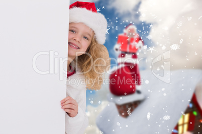 Composite image of cute girl with poster