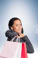 Smiling woman holding shopping bag