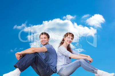 Composite image of couple both sitting on floor