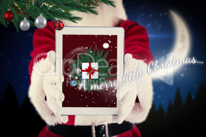 Composite image of santa presents a tablet pc