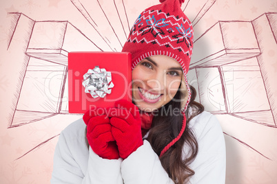 Composite image of festive brunette in winter clothes showing re