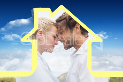 Composite image of cute smiling couple standing outside facing e