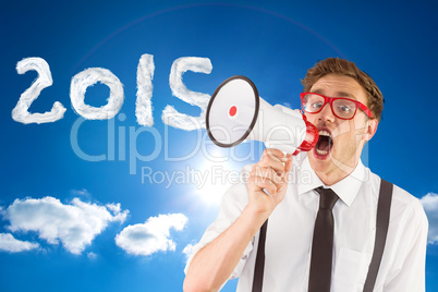 Composite image of geeky businessman shouting through megaphone