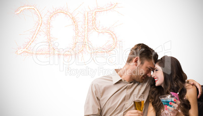 Composite image of cute couple drinking