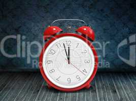 Composite image of alarm clock counting down to twelve