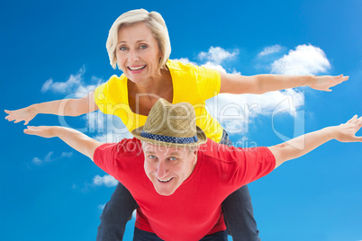 Composite image of mature couple joking about together