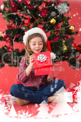 Composite image of festive little girl opening a gift