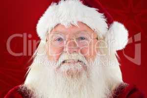 Composite image of santa smiles in the camera