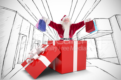 Composite image of santa standing in large gift