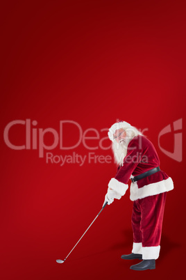 Composite image of santa claus is playing golf