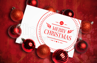 Composite image of banner and logo saying merry christmas