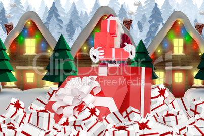 Composite image of santa standing in large gift