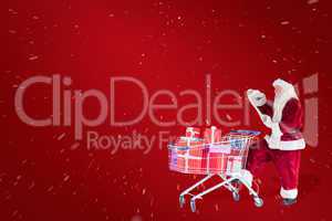 Composite image of santa pushes a shopping cart while reading