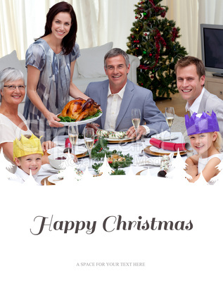 Composite image of family celebrating christmas dinner with turk