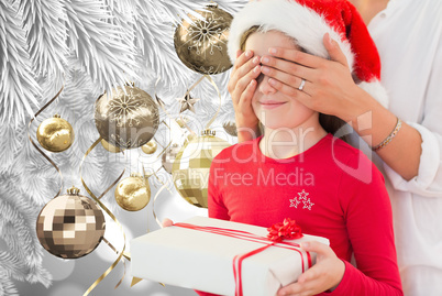 Composite image of little girl getting gift