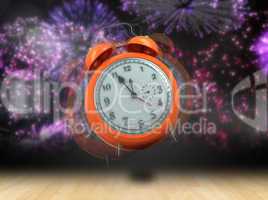 Composite image of alarm clock counting down to twelve