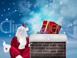 Composite image of santa claus sits and meditates