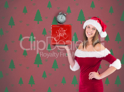 Composite image of pretty santa girl smiling at camera and prese
