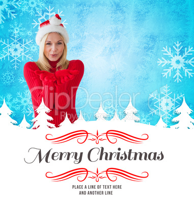 Composite image of happy festive blonde