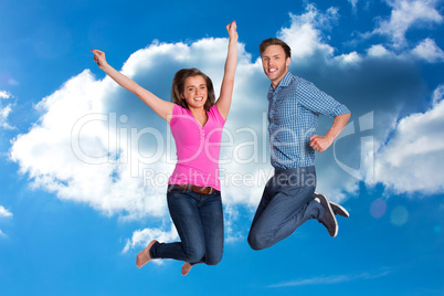 Composite image of cheerful young couple jumping