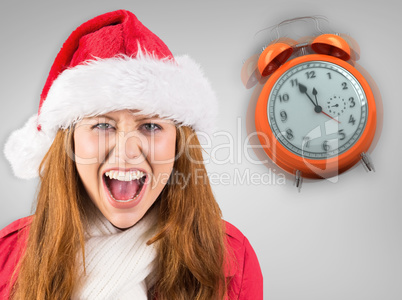 Composite image of festive redhead shouting at camera