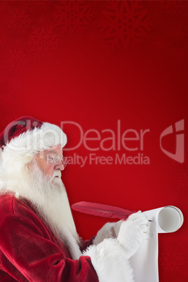 Composite image of father christmas writes a list