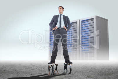 Composite image of business people supporting boss