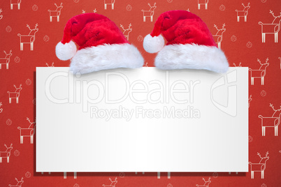 Composite image of santa hat on poster