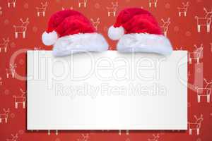 Composite image of santa hat on poster