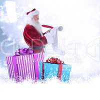 Composite image of father christmas writes a list