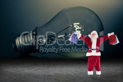 Composite image of santa carrying gifts