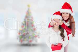 Composite image of mother and daughter with gift