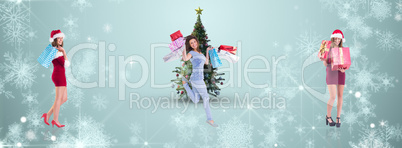 Composite image of pretty woman in santa hat opening a gift smil