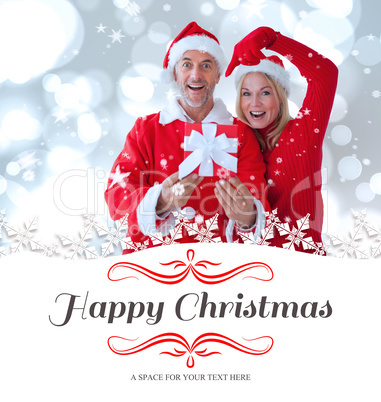 Composite image of festive couple