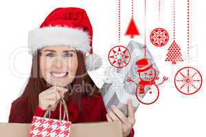 Composite image of woman with gifts