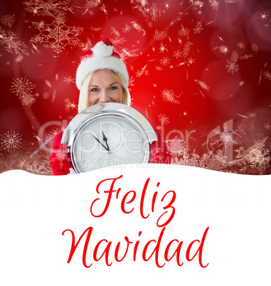 Composite image of happy festive blonde with clock