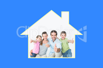 Composite image of cute family smiling at camera together showin