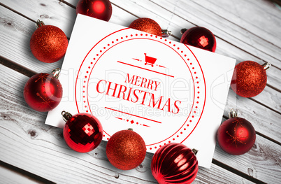 Composite image of banner and logo saying merry christmas