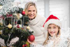 Composite image of festive mother and daughter decorating christ