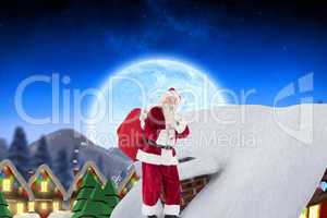 Composite image of santa on cottage roof