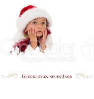 Composite image of cute little girl wearing santa hat and tinsel