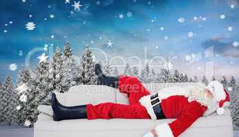 Composite image of santa claus sleeping on the couch