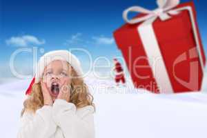 Composite image of festive little girl with hands on face