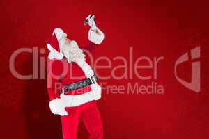 Composite image of happy santa claus singing with microphone