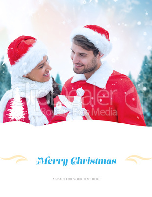 Composite image of festive young couple holding gift