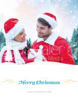 Composite image of festive young couple holding gift